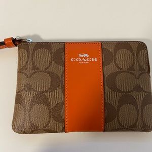 Brand new Coach wristlet